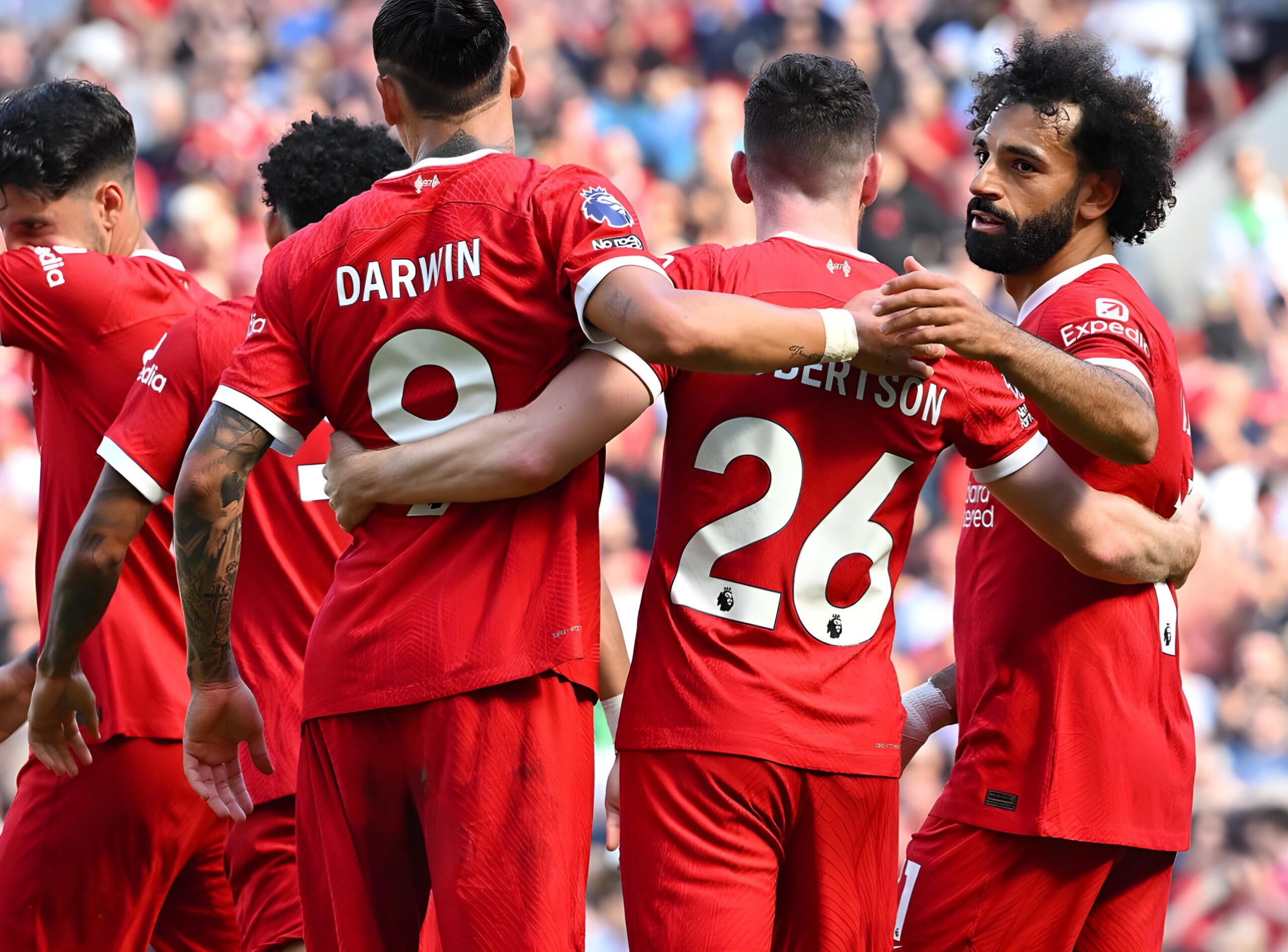 Liverpool players with a goal celebration